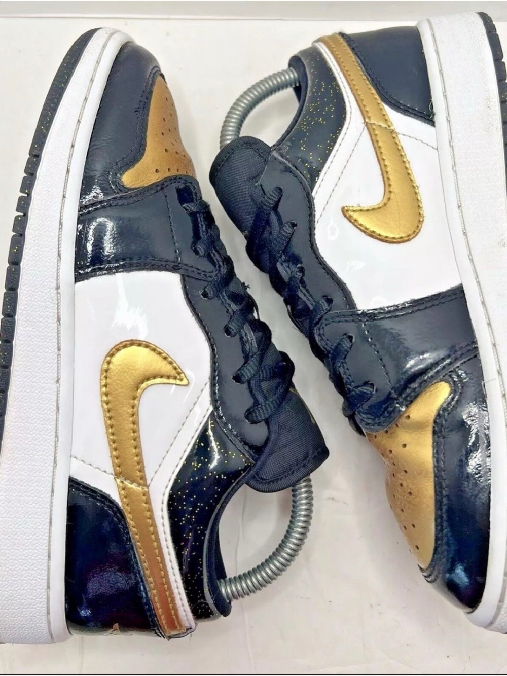 Nike Air Jordan 1 Low Kids Black and Metallic Gold Low-Top Sneakers